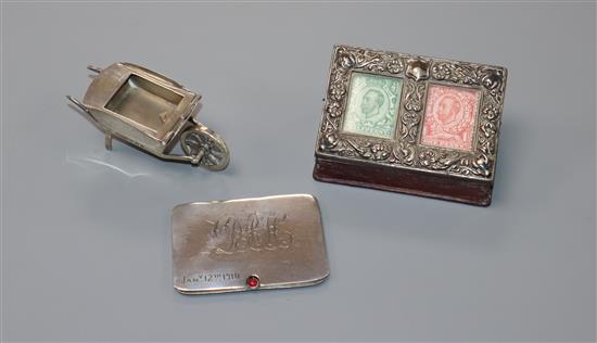 Three assorted Edwardian silver stamp cases.